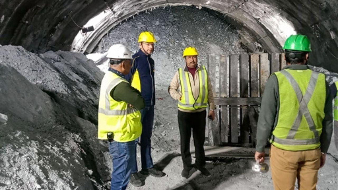 Preparations are underway to set up a platform for the auger drilling machine, ensuring a stable and efficient operation. The 900mm diameter mild steel pipes are being strategically used to facilitate the escape route construction.