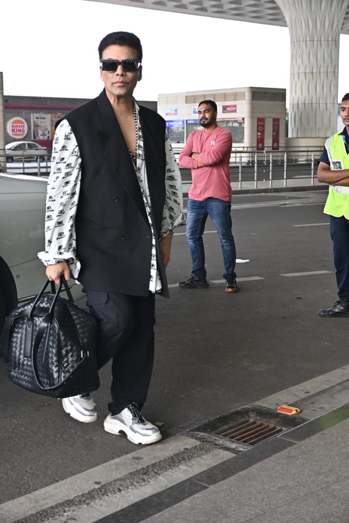 Karan Johan aced his airport look in stylish black and white outfit 