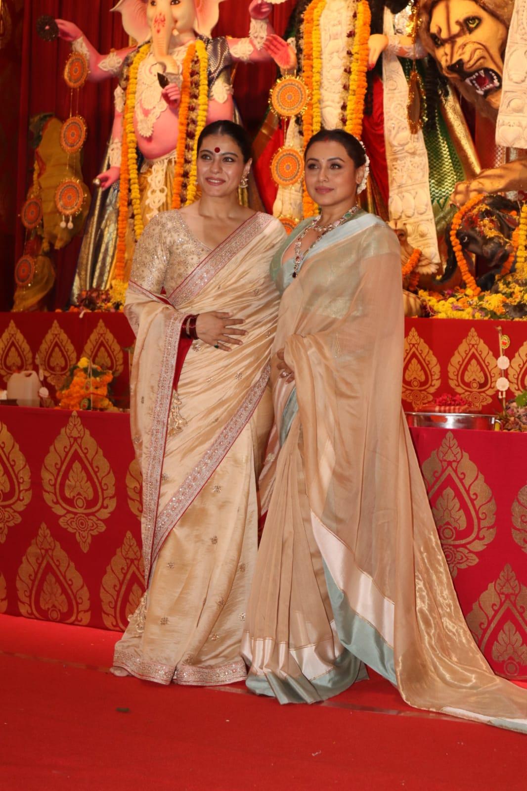 Kajol and Rani Mukerji posed together as they were spotted at their family's puja pandal