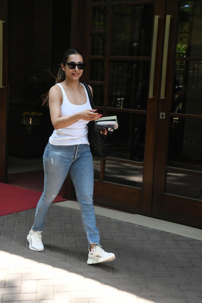 Malaika Arora was spotted wearing a white top paired with blue jeans