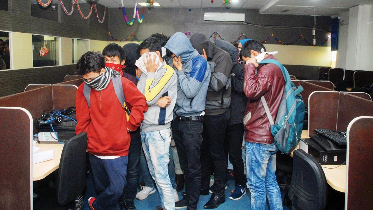 Over the last ten years, scam call centres have been busted all over the country, including Mumbai, Thane, Kolkata and Noida. In this 2018 raid by the Delhi police, 126 accused were arrested and were alleged to be making as much as $50,000 per day by defrauding US citizens. Pics/Getty Images