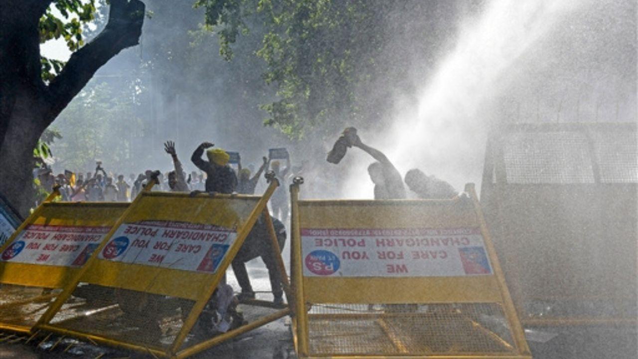 Chandigarh police deployed a water cannon to disperse AAP workers attempting to 'gherao' the Punjab BJP office.