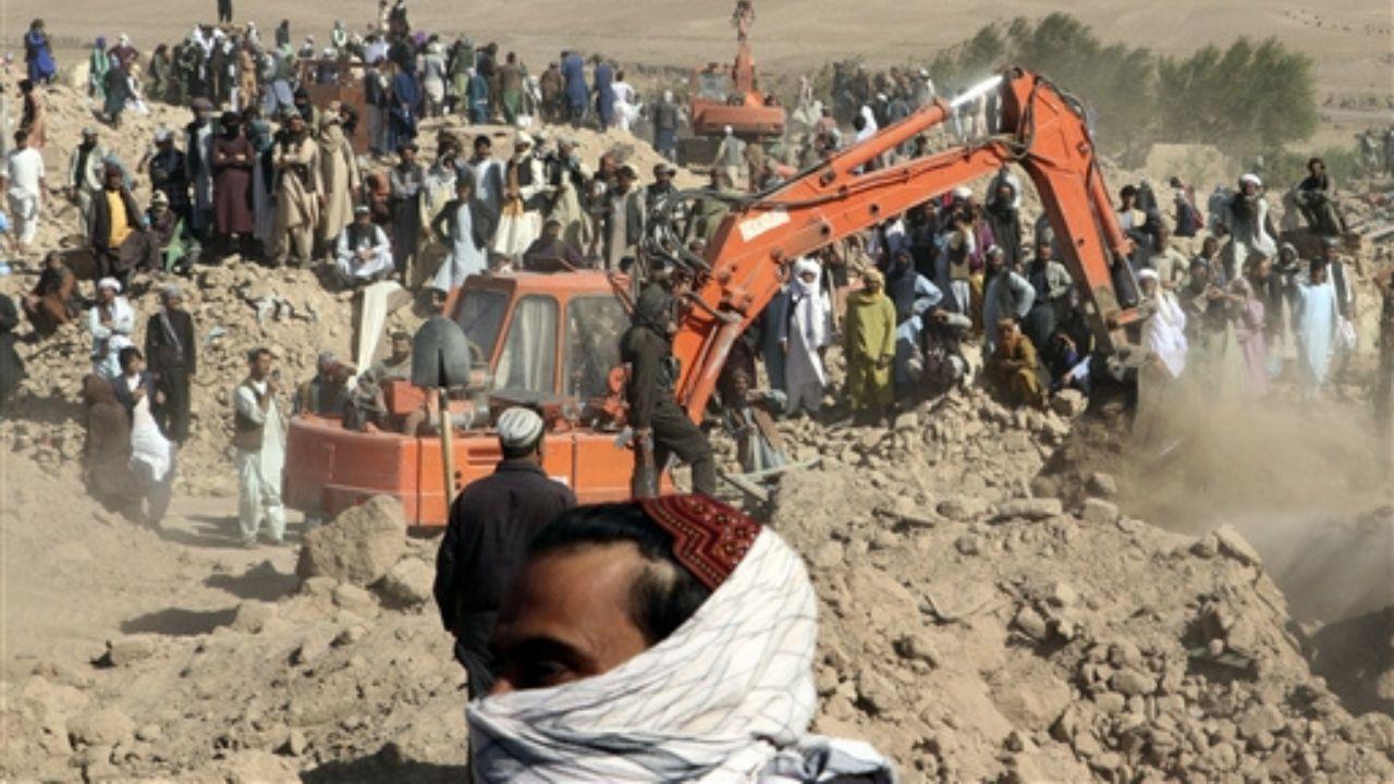 Elsewhere in Herat, grieving families are forced to dig graves for their loved ones lost in the tragedy. In the district of Zendah Jan, a sombre bulldozer clears the ground for a long row of graves. For many, the agony of searching for family members in the ruins is followed by the heart-wrenching task of burying them.