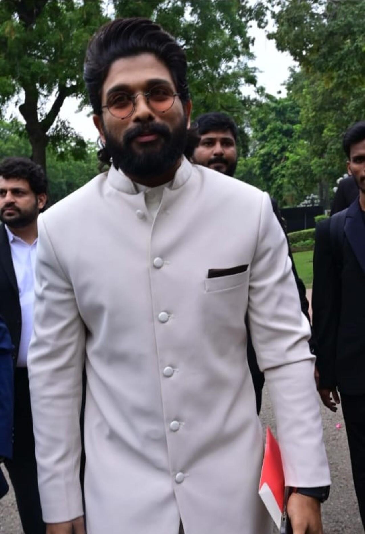 Allu Arjun looked dashing as he chose a white button-up suit to attend the grand ceremony