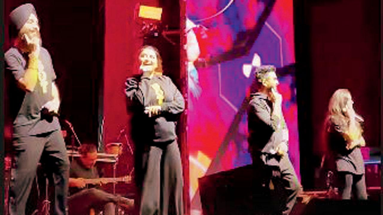 (Third from left) Amit Trivedi performs alongside his team