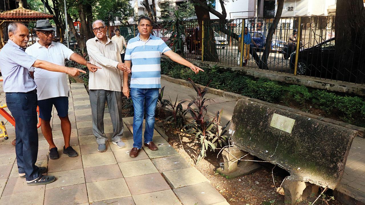 Walkers point to a broken bench in the garden. Pics/Anurag Ahire