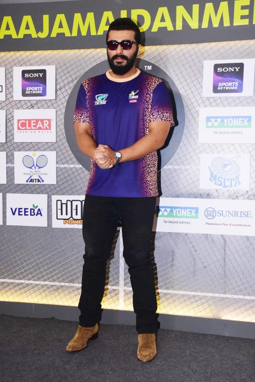 Arjun Kapoor posed for the paparazzi as he went to attend the Tennis Premier League season 5 auctions at the Sahara star