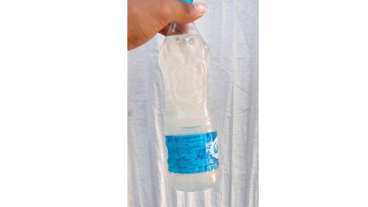 Water collected in a bottle at Dr Subramanaiam Nagar in H-East Santacruz visibly appears contaminated