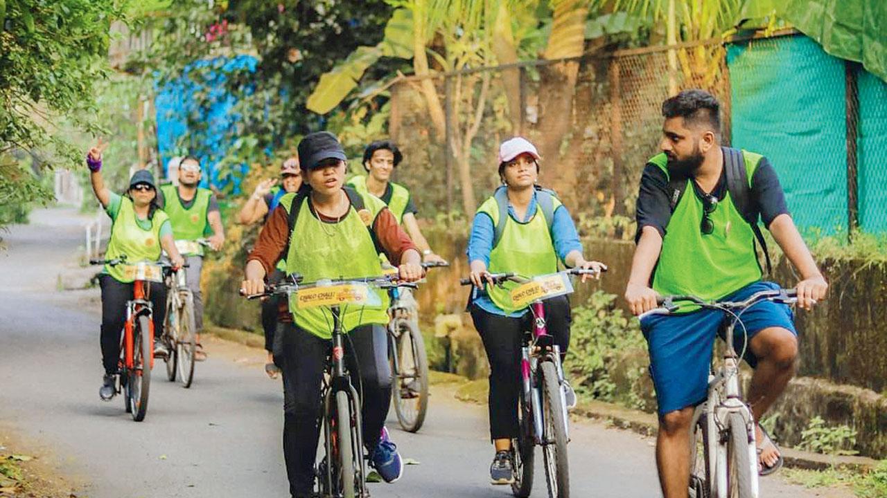 Participants cycle across Vasai at a previous edition of the tour