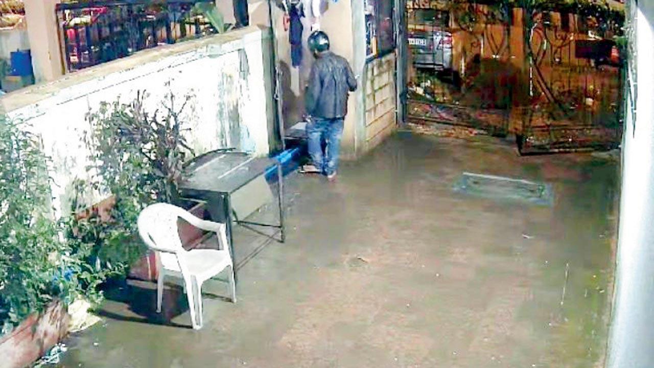 A CCTV grab showing the Zomato delivery boy entering the guards cabin