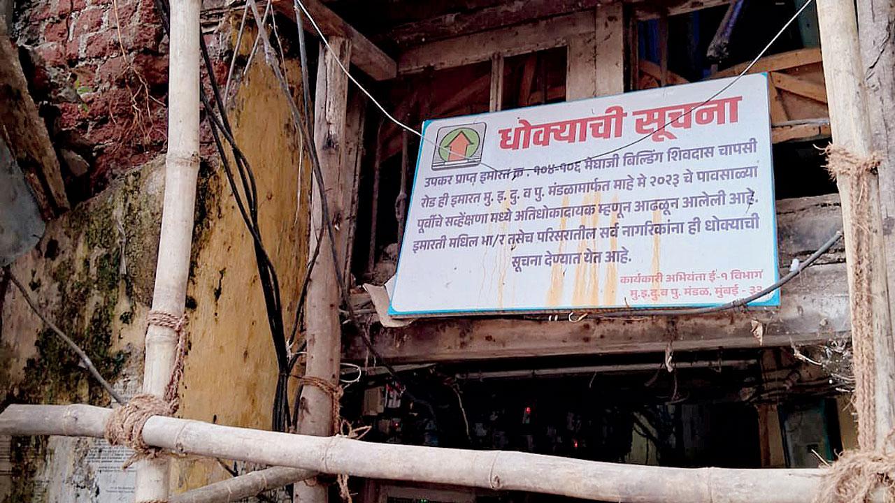 The demolition order pasted on one of the three wings of Meghji Building Tenants Co-operative Housing Society