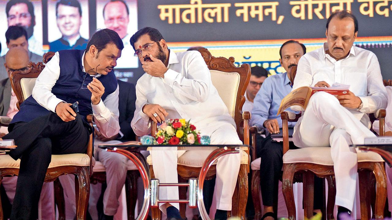 Talk of unrest escalated on Tuesday after Eknath Shinde (centre) and Devendra Fadnavis, seen here with Ajit Pawar, landed in Delhi leaving behind their engagements in Mumbai. File pic/Sameer Markande