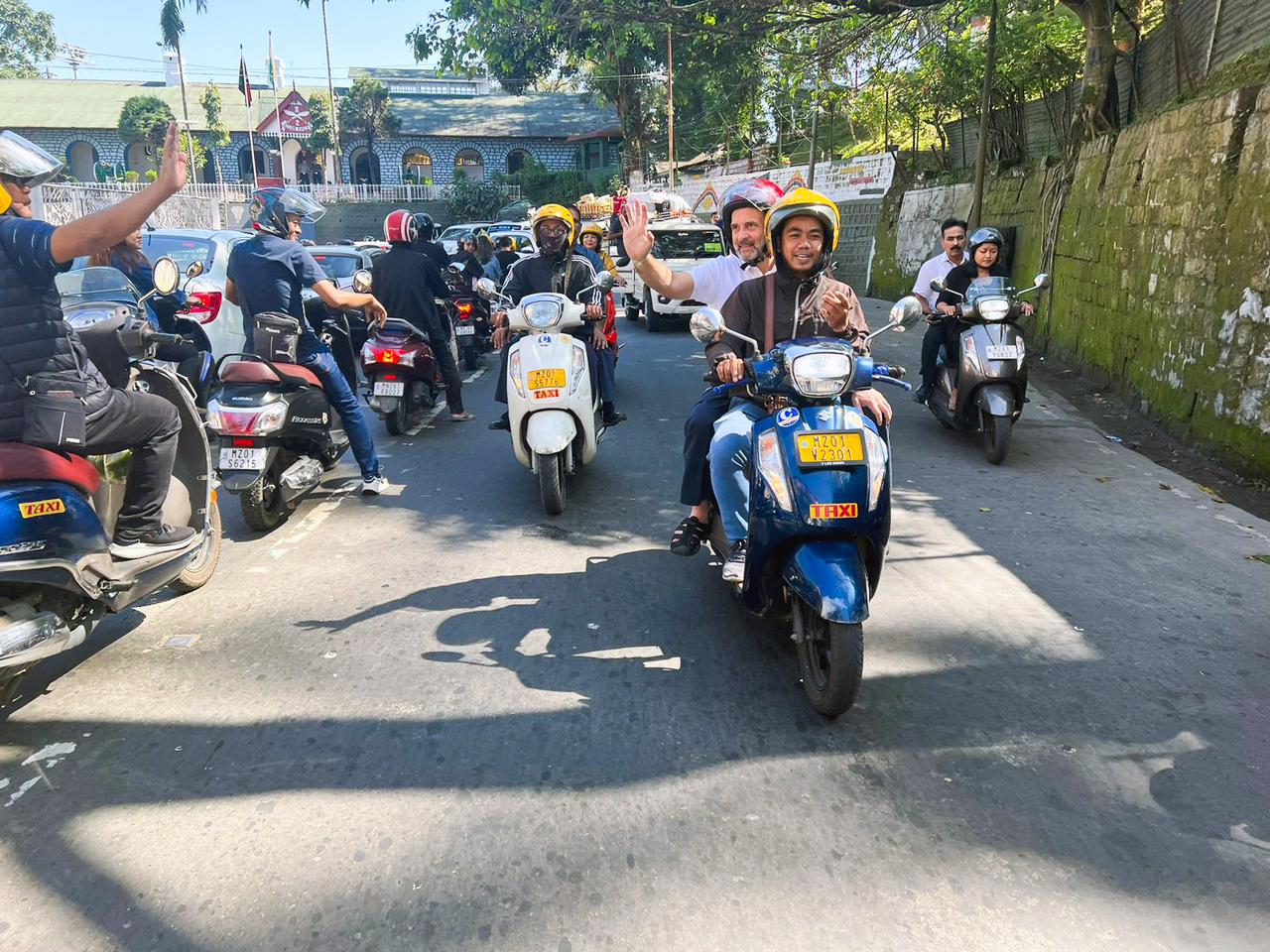 The Congress MP rode a pillion on a two-wheeler to reach the residence of Thanhawla