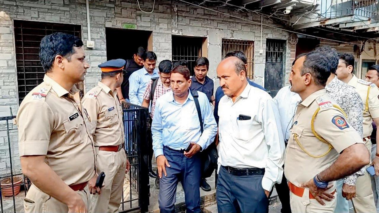 Local police, NIA officers at Abdul Wahid Shaikh’s residence in Vikhroli early Wednesday. PIC/Rajesh Gupta; (right) mid-day’s Sept 13, 2015 report on Shaikh being freed
