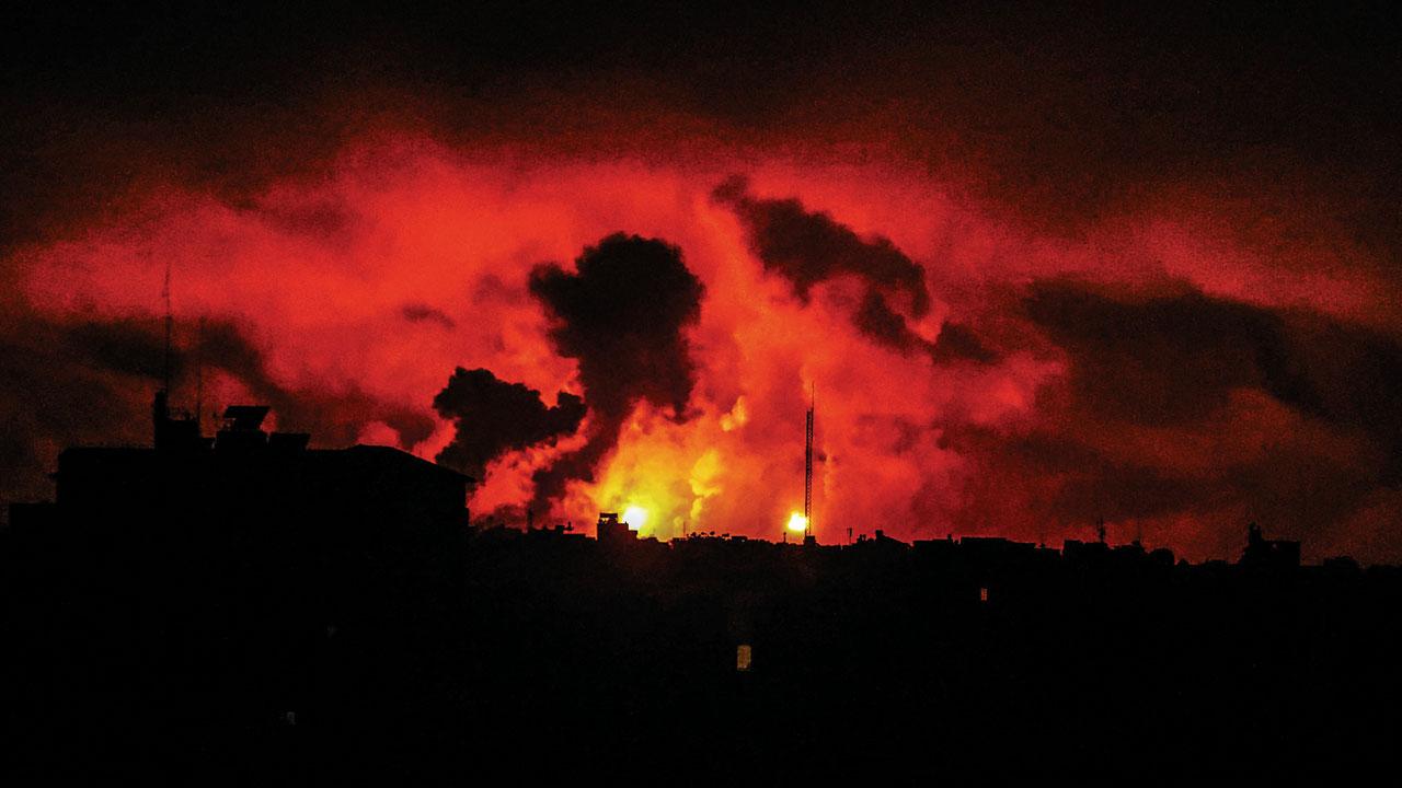 Smoke fills the Gazan sky as Israel conducts airstrikes on the 21st day of the conflict. PIC/GETTY IMAGES