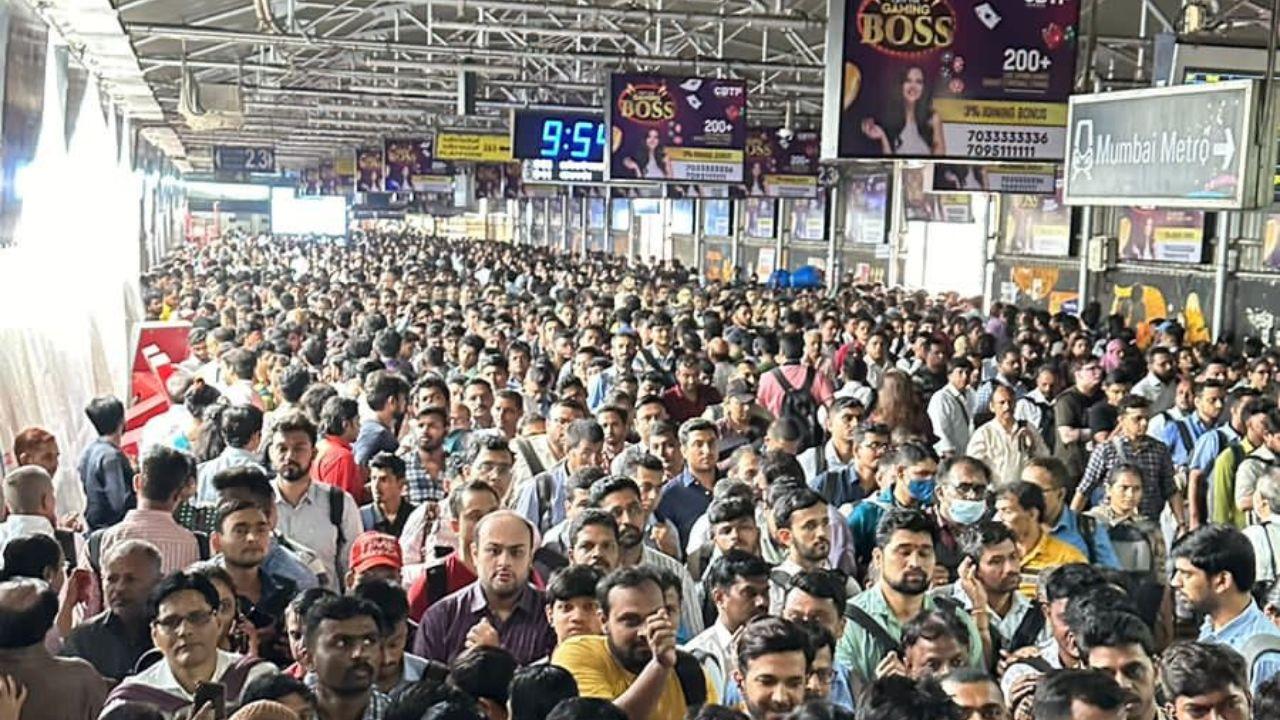 Metro commuters throng the bridge that connects to Ghatkopar railway station on October 3