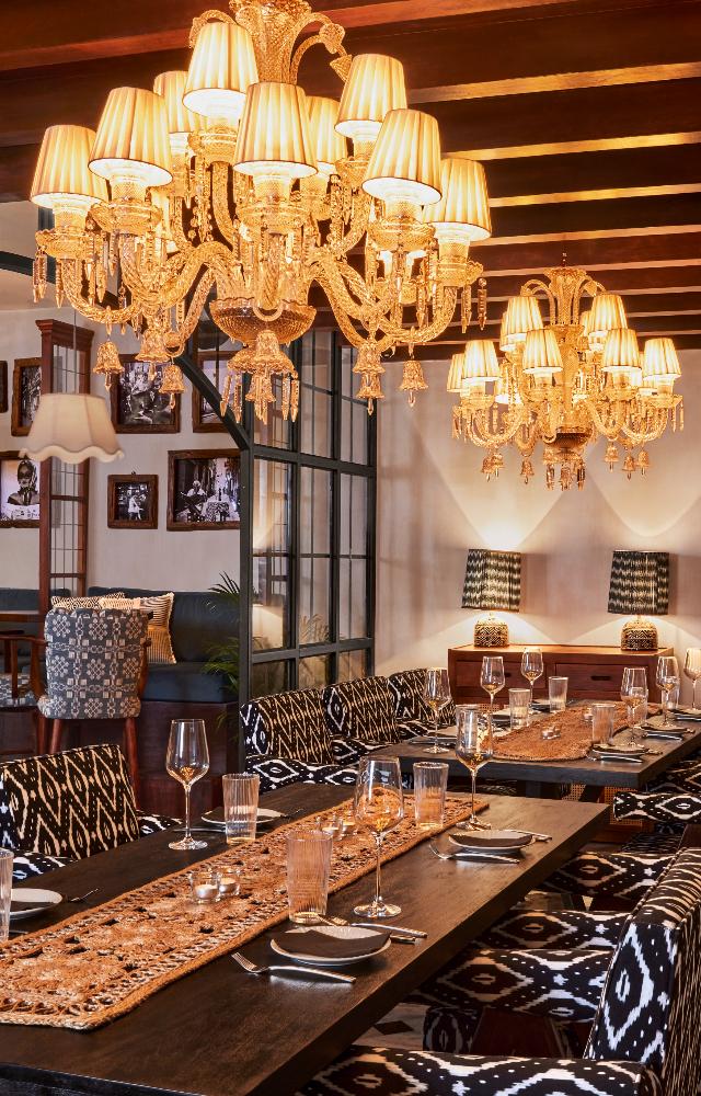 The 150-seater space features a mix of long communal tables, plush sofas, an island bar and two intimate private dining spaces