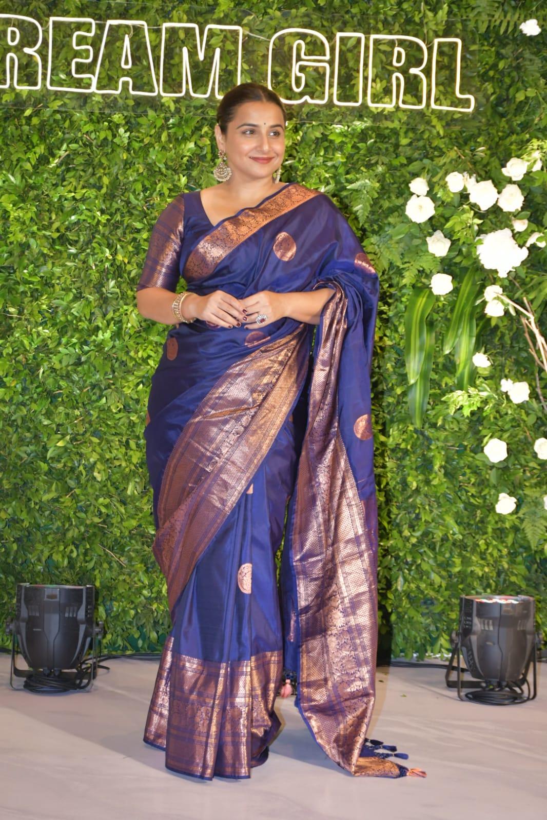 Vidya Balan was snapped at the event in a classic indigo-blue saree