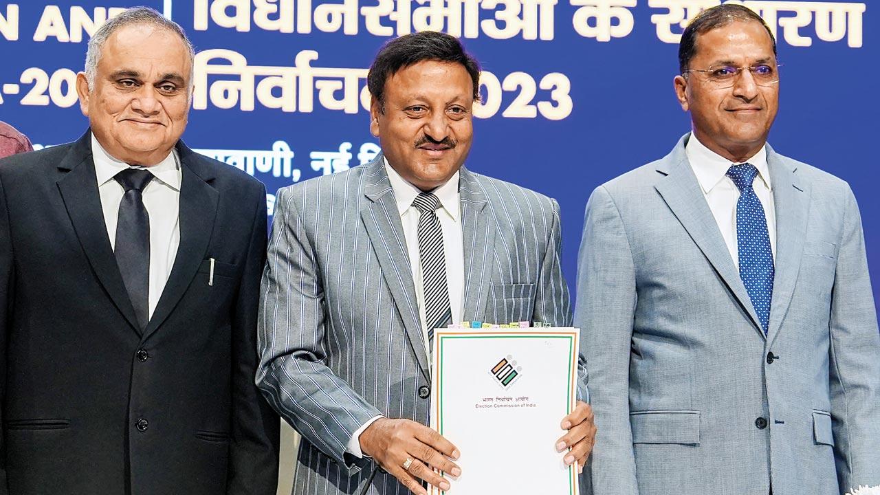 Chief EC Rajiv Kumar with ECs Anup Chandra Pandey, Arun Goel during a press conference. Pic/PTI 