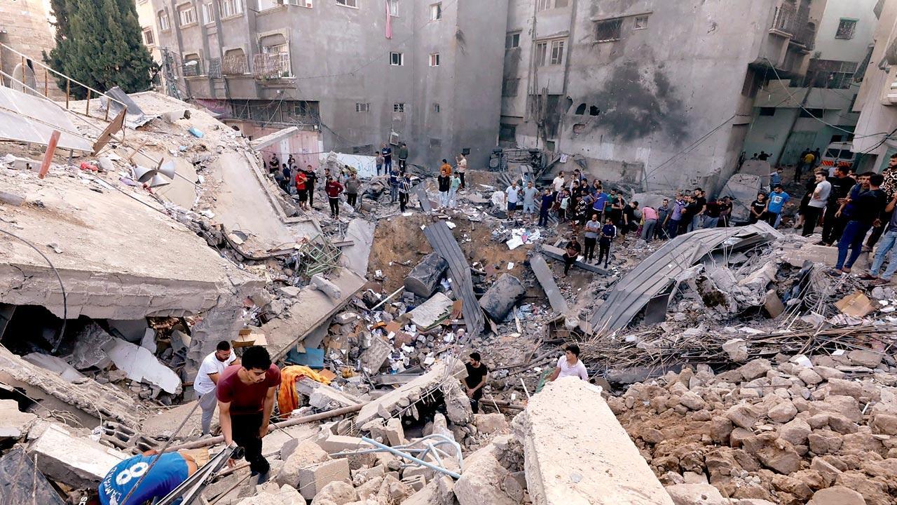 Israel pounds Gaza, town near Lebanon evacuated