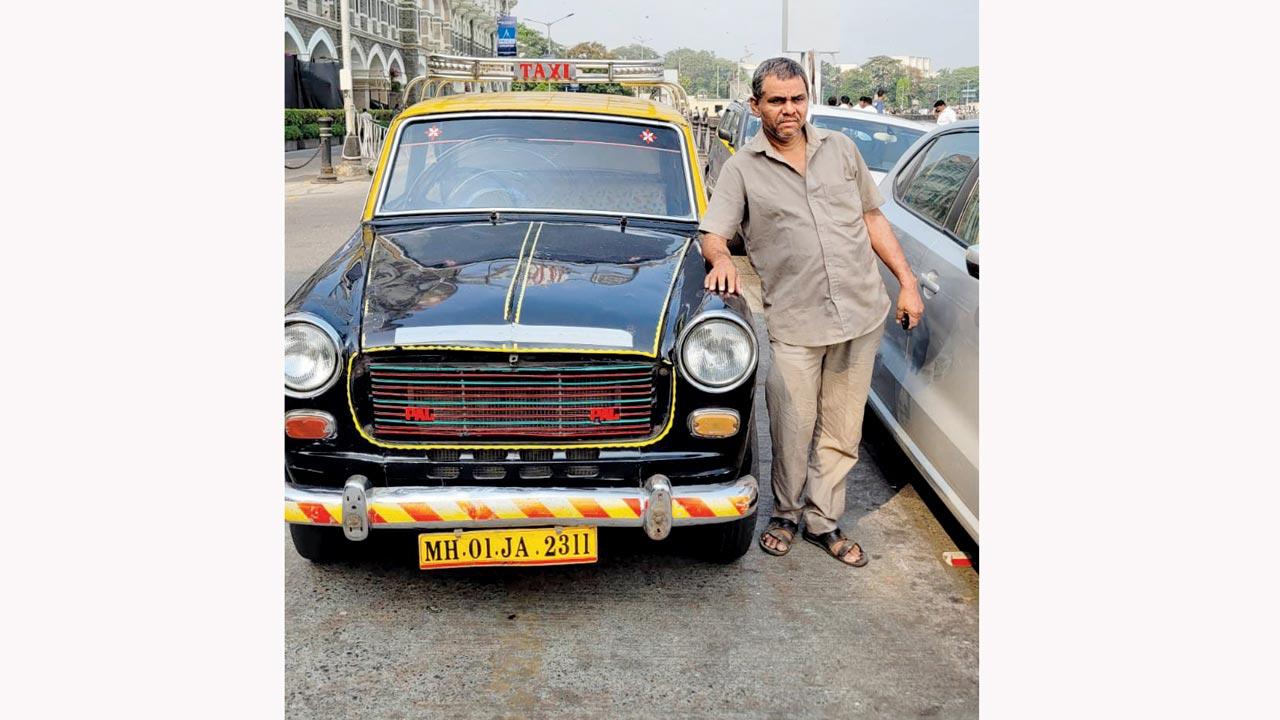 Raees Ahmed with his kaali-peeli. Pic courtesy/Daniel Sequeira