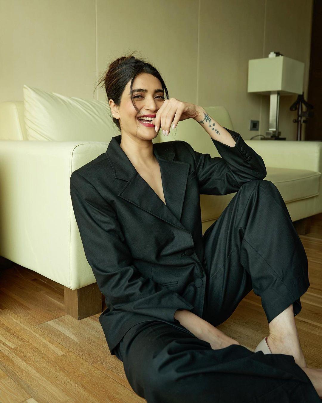 Sometimes, when we want to lift our spirits, we decide to dress up, but there's always that worry of overdoing it. Well, look no further! Karishma Tanna's black co-ord set is the answer. It's bold, classy, and the perfect fit to impress your colleagues without going overboard