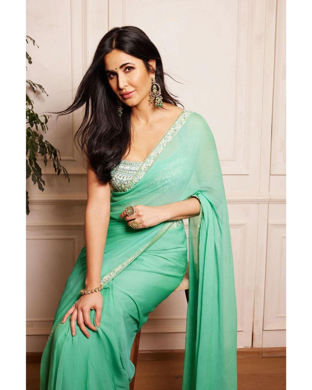 Katrina Kaif looked stunning in a green saree paired with an embroidered white blouse. Her hair was left open. This look can be your savior if you're planning to keep it simple