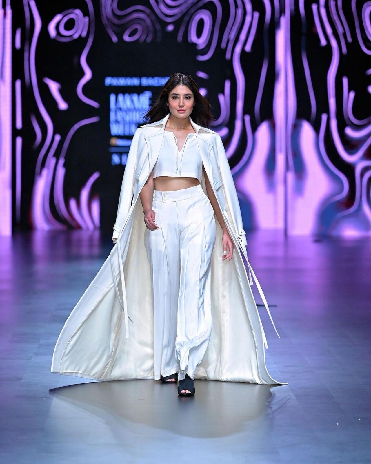 Kritika Kamra walks elegantly in a white cape style outfit