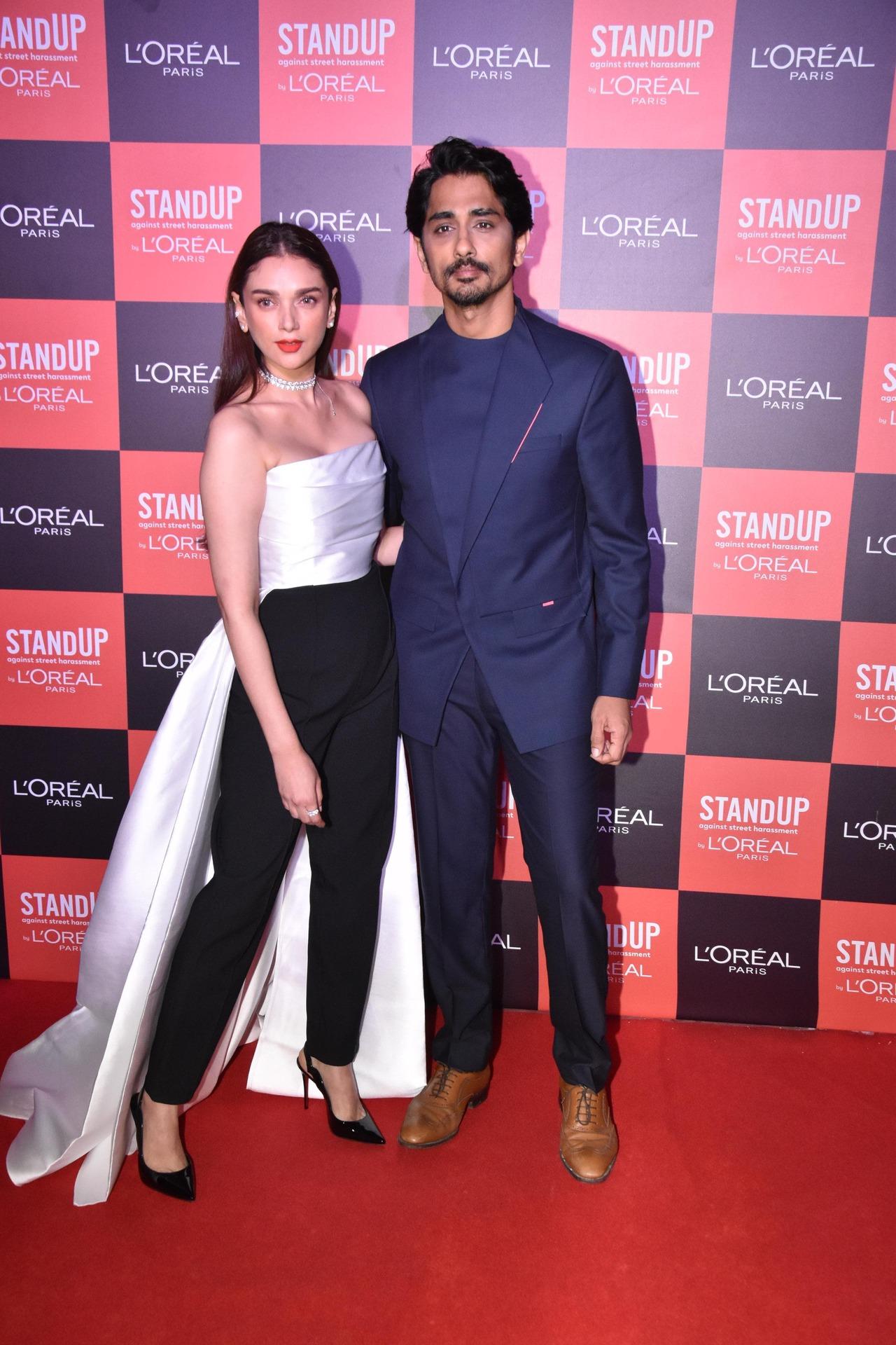 Aditi Rao Hydari and Siddharth made for a stylish couple as they posed together for the paparazzi