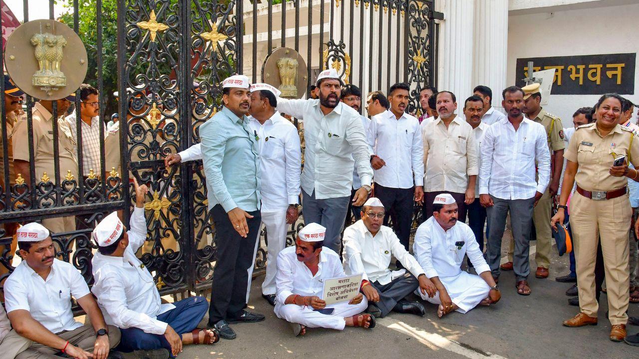 Maha MLAs hold protest at Raj Bhavan, seek special session to address issue Maha MLAs hold protest at Raj Bhavan, seek special session to address issue