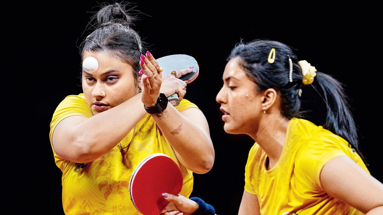 Sutirtha Mukherjee (left) and Ayhika Mukherjee during the women’s doubles table tennis semi-final at Hangzhou, China, yesterday. Pic/PTI