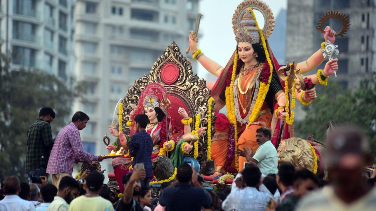 The procession featured an intricately crafted idol of Goddess Durga adorned with vibrant clothing and jewellery, attracting the attention of both participants and onlookers. Devotees sang hymns and offered prayers throughout the journey.