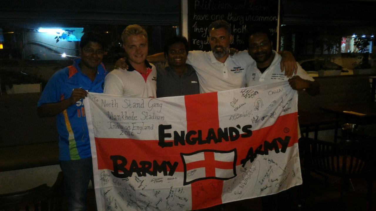 Before the 2016 test match against England, DeSouza and Vipul Yadav, another ardent fan and member of the group, had written the text of how Brabourne and Wankhede were special for cricket in Mumbai and that was printed on T-Shirts to become the official T-Shirt of the group. They met the Barmy Army, who had come down to watch the match like they do, at the stadium. The North Stand Gang presented the T-shirt to them as their token of appreciation. They then invited them to a party at a pub on Marine Drive. Each of the members gave the gang a flag and their songbook as well to sing with then the next time there is an India vs England match at the Wankhede.
