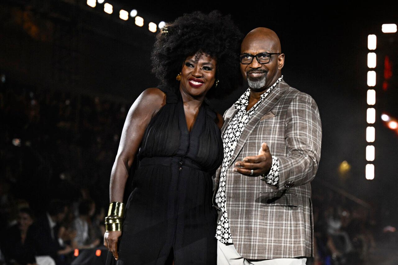 US actress Viola Davis and US actor Julius Tennon presents a creation for L'Oreal Paris during a show as part of the Paris Fashion Week Womenswear Spring/Summer 2024 in Paris 