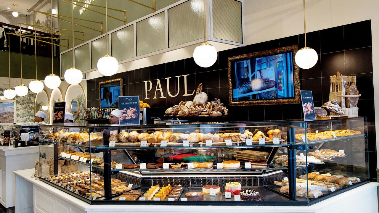 The interiors of Paul have a Parisian cafe feel and they serve a selection of bread, viennoiserie, cakes, sandwiches, meals, and desserts