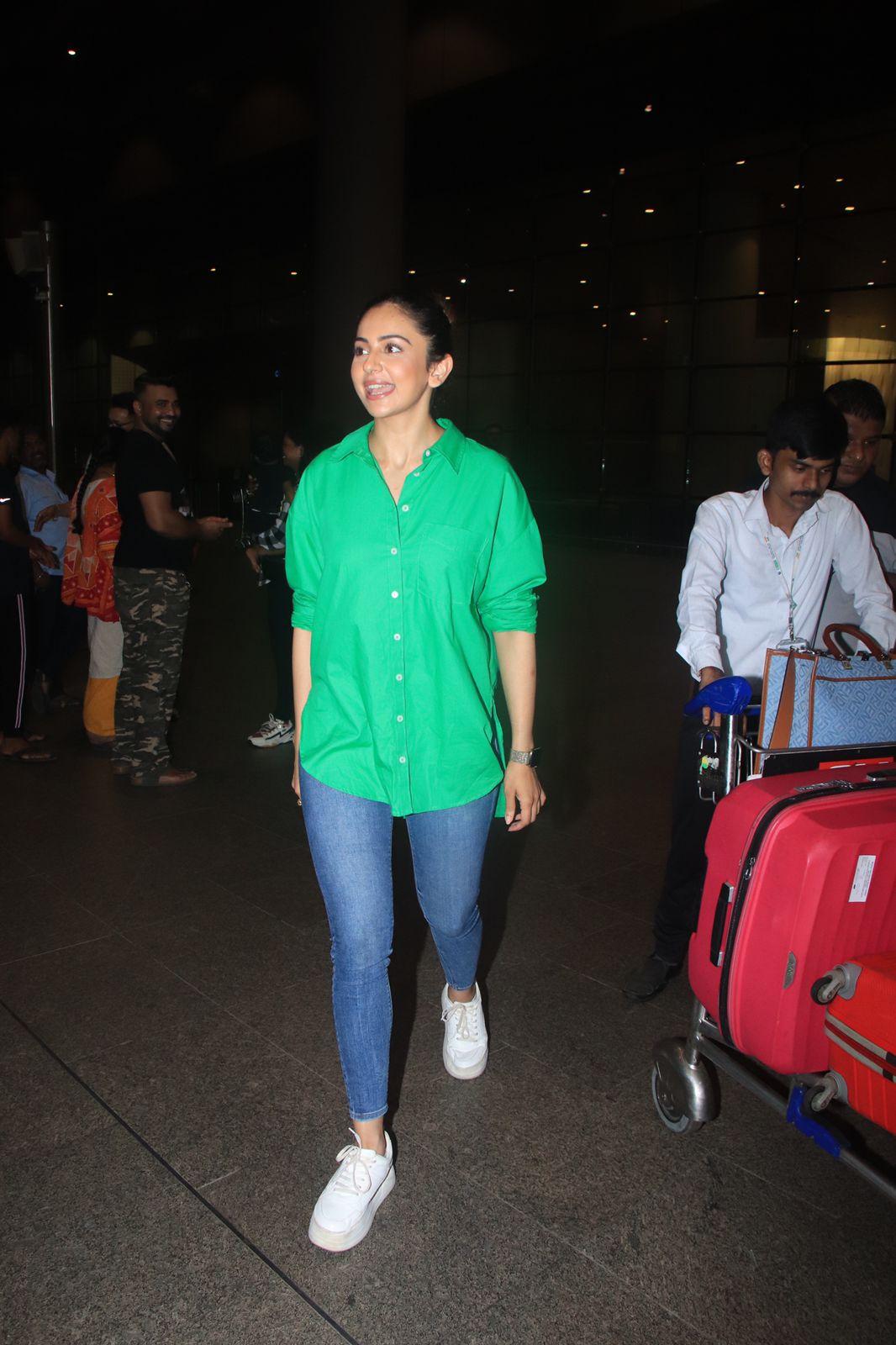 Rakul Preet Singh opted for a green top and blue jeans for her comfy airport look