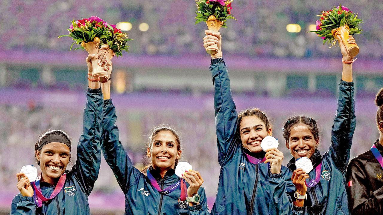 India’s silver medal-winning women’s 4x400m relay team of Vithya Ramraj, Prachi, Subha Venkatesan and Aishwarya Kailash Mishra in Hangzhou yesterday