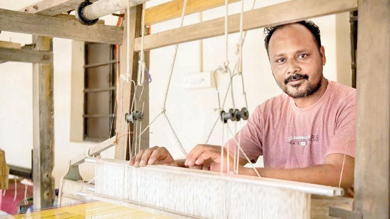 Weaver Bharatbhai Jepar from Mota Varnora village in Kachchh works on a frame loom used for weaving. Pic courtesy/Hashim Badani