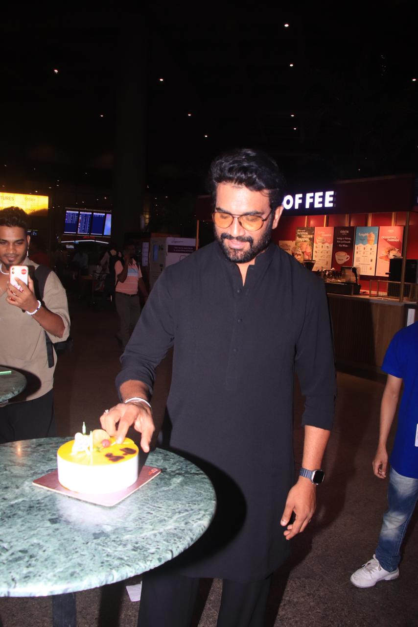 Sharad Kelkar cut a cake with the paparazzi at the airport