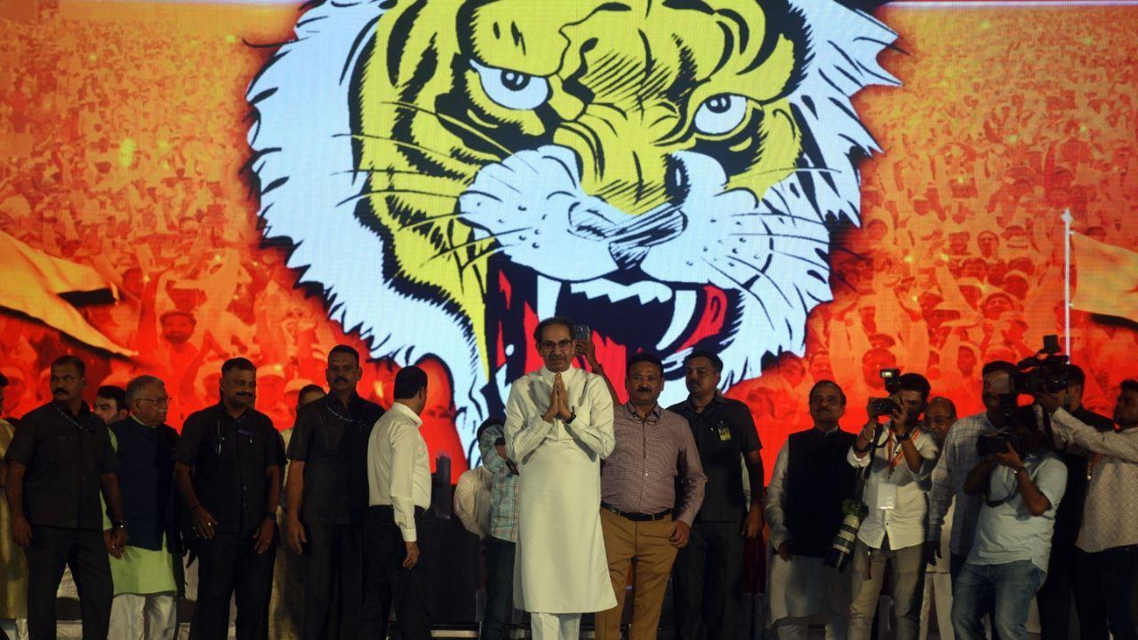 Uddhav Thackeray delivered a fiery speech at the Shiv Sena's Dussehra rally, vehemently condemning party members who switched allegiances, labelling them as traitors with an indelible stain extending to their descendants. Pics/Sameer Markande
