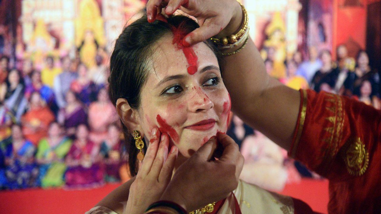 Over time, this practice evolved into the festive and symbolic Sindoor Khela observed today. Additionally, Sindoor Khela was also conceived as a way for women to strengthen their marital bonds and pray for the long and prosperous lives of their husbands. It's not only a religious act but also a celebration of married life and the collective spirit of sisterhood among Bengali women.