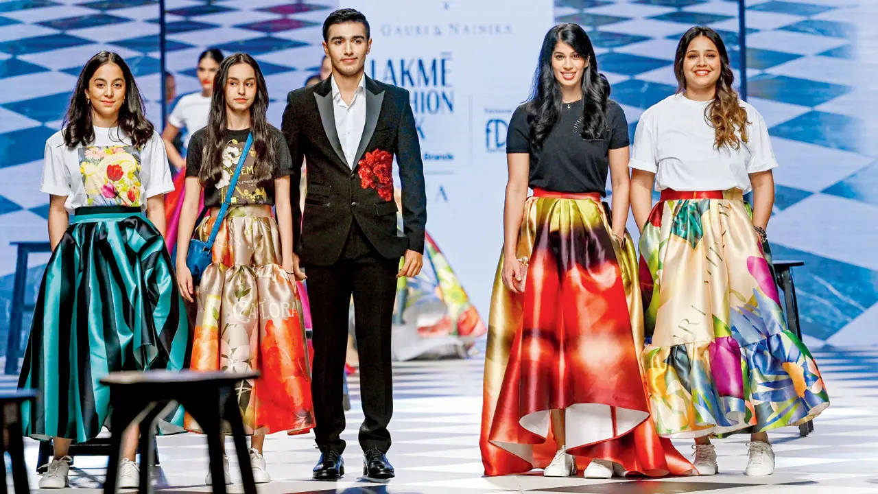 (From left) Tanvi Khanna, Anahat Singh, Abhay Singh, Joshna Chinappa and Dipika Pallikal walk the ramp for Gauri and Nainika Karan
