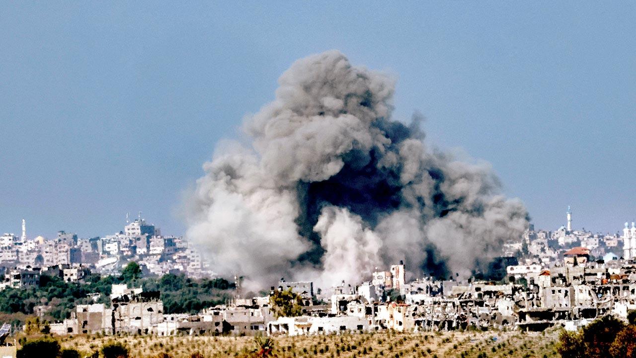 Smoke over the northern Gaza Strip after an Israeli strike. Pic/AP