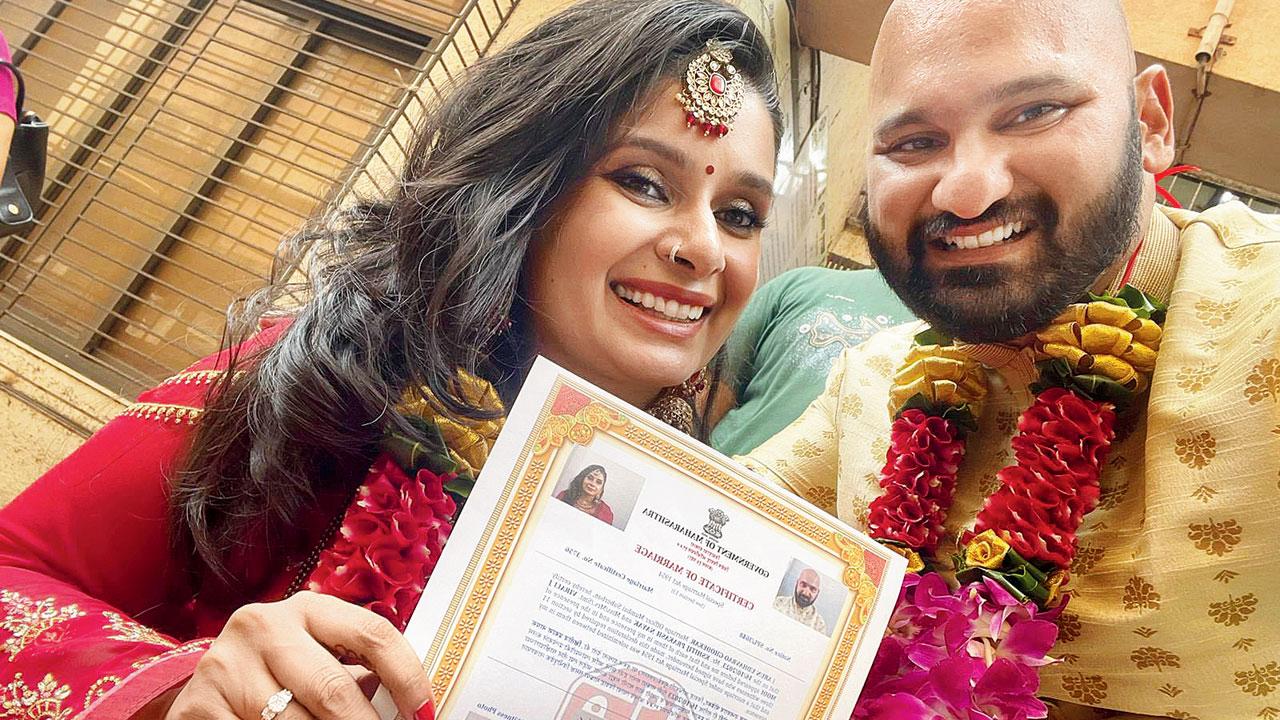 Virali Modi and her husband with their marriage certificate
