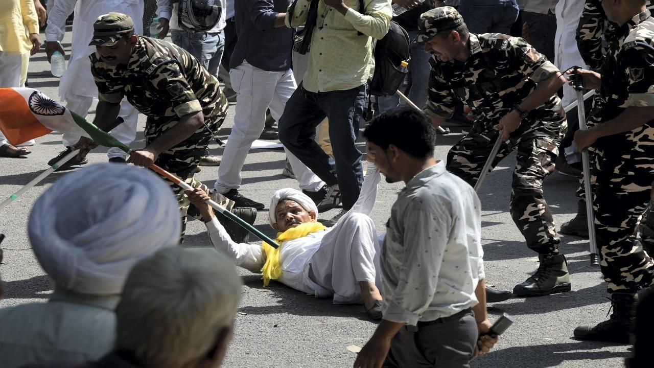 In Pics: AAP holds protest against arrest of Sanjay Singh