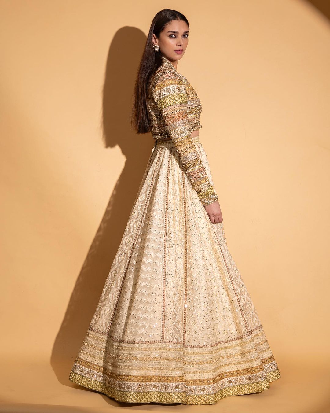 The actress graced the runway in an ivory lehenga, adorned with beautiful Kashmiri embroidery that matched the base color. 
