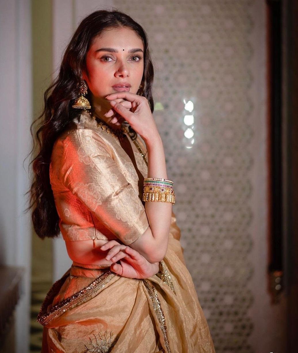 Aditi Rao Hydari is gold personified in this silk lehenga.