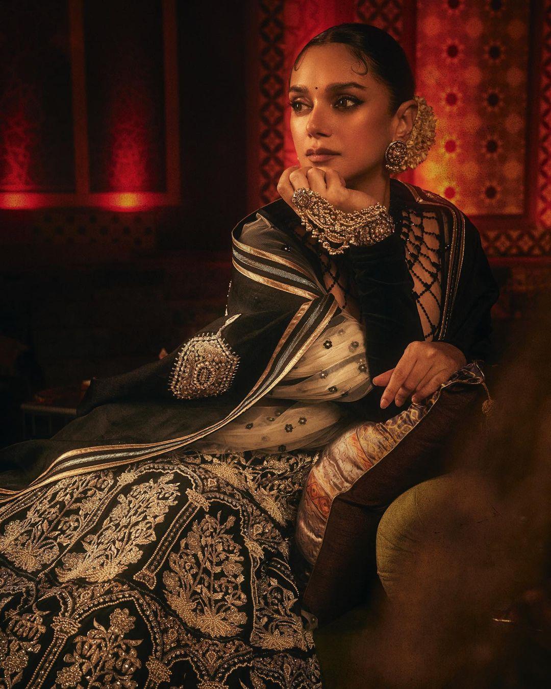 Aditi Rao Hydari was dressed in a lehenga set with a black modern-style top and a dupatta. She looked stunning in the black, white, and silver combo.
