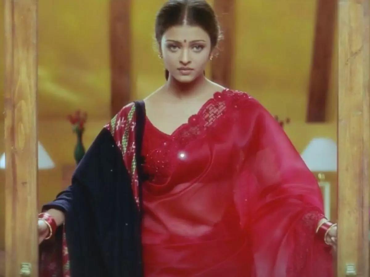 Back in 1999, the movie Hum Dil De Chuke Sanam hit the big screen. It had Aishwarya Rai Bachchan, Salman Khan, and Ajay Devgn in the lead roles, and the film was a huge success, especially for its love story. But what really caught everyone's eye was Aishwarya Rai Bachchan's amazing wardrobe. She looked stunning in various outfits, from simple lehenga cholis to this red elegant organza sarees.