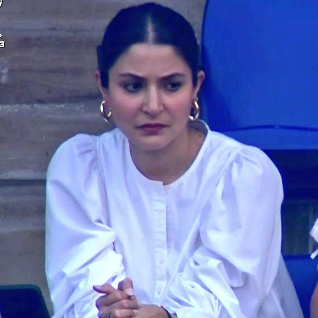 All eyes were on Anushka Sharma, as she looked stunning in a white dress while cheering for her husband, the former Indian cricket captain, Virat Kohli, from the stands during an exciting match.